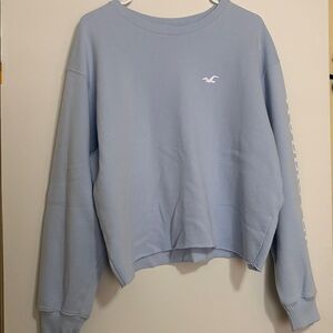 Hoilister woman light blue sweatshirt